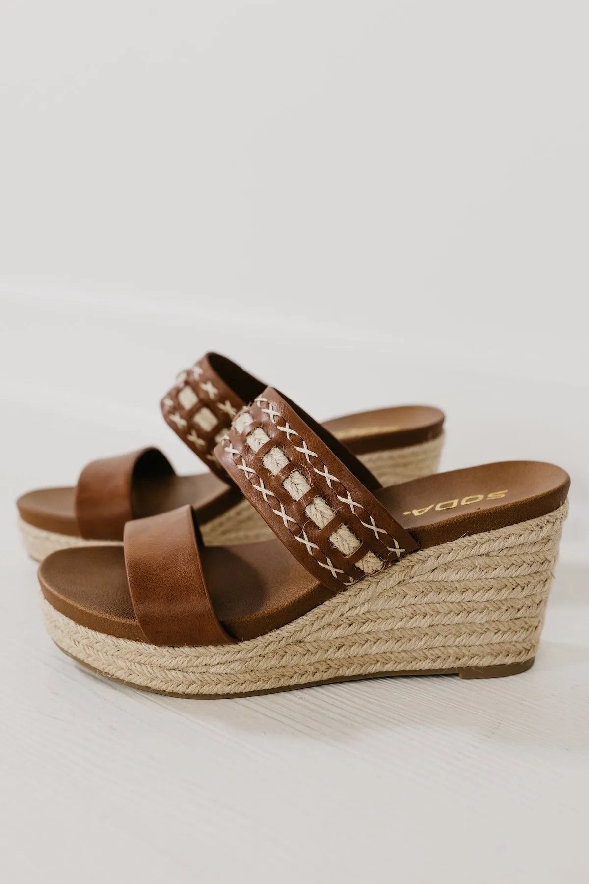 The Bow Platform Wedge Sandal